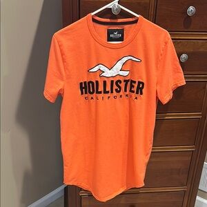 Hollister men’s casual shirt w/ flying seagull on front, orange, size medium